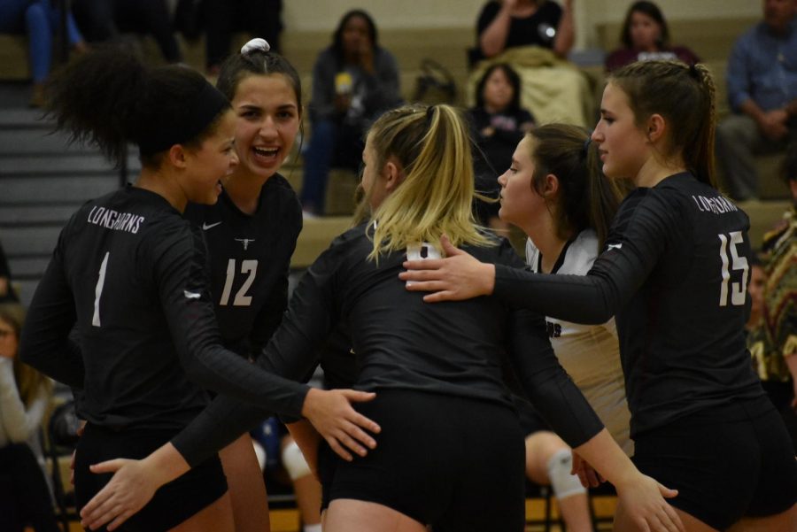 (Left to right) Alexandra Tennon (11), Logan Lednicky (10), Mackenzie Rock (12) and Riley Steubing (9) celebrating together after a score.