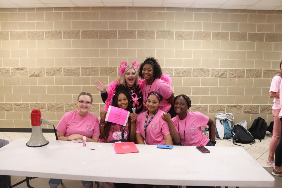  Ms.Patterson selling tickets for the pink out pep rally