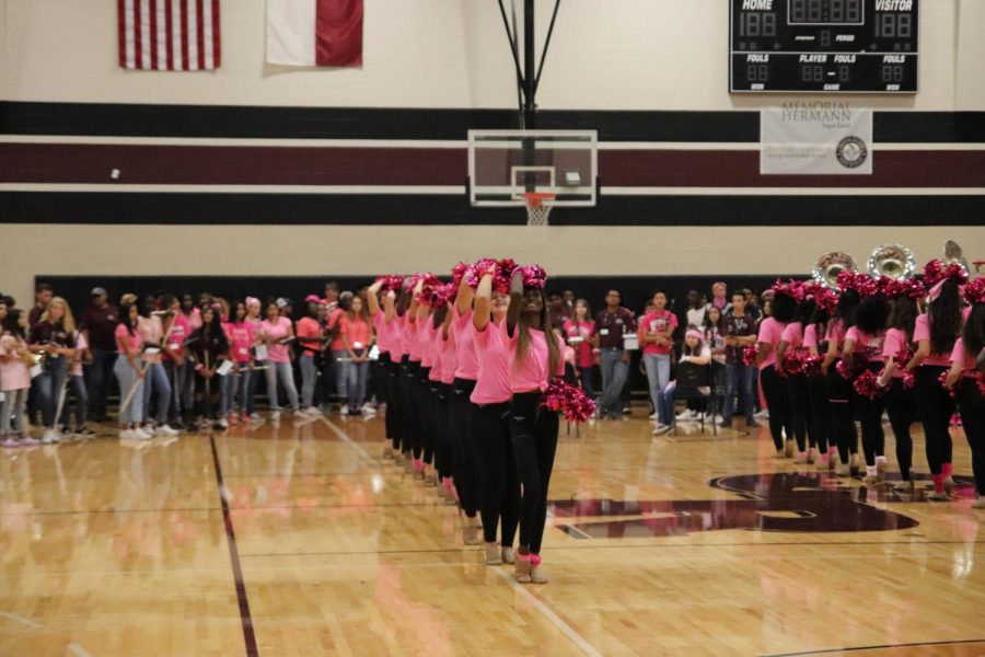 Grhs Lariettes preforming their hardest for brest cancer