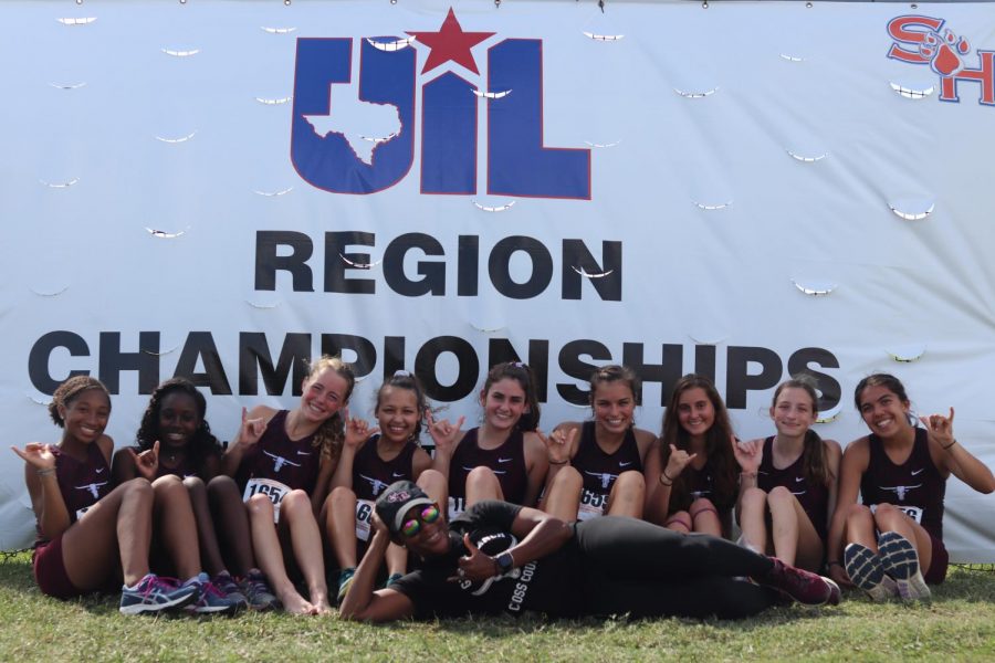 From left to right, Ava Curtis (9), Kianna Stamps (9), Britton Bielitz (11), Chantell Maina (12), Coach Dutch, Alyssa Hiekkila (12), Brooke Johnson (12), Jessica Paquette (10), Madison Haldiman (9), and Sydney Delgado (12) competed for 8th place at the Region 3 XC meet.