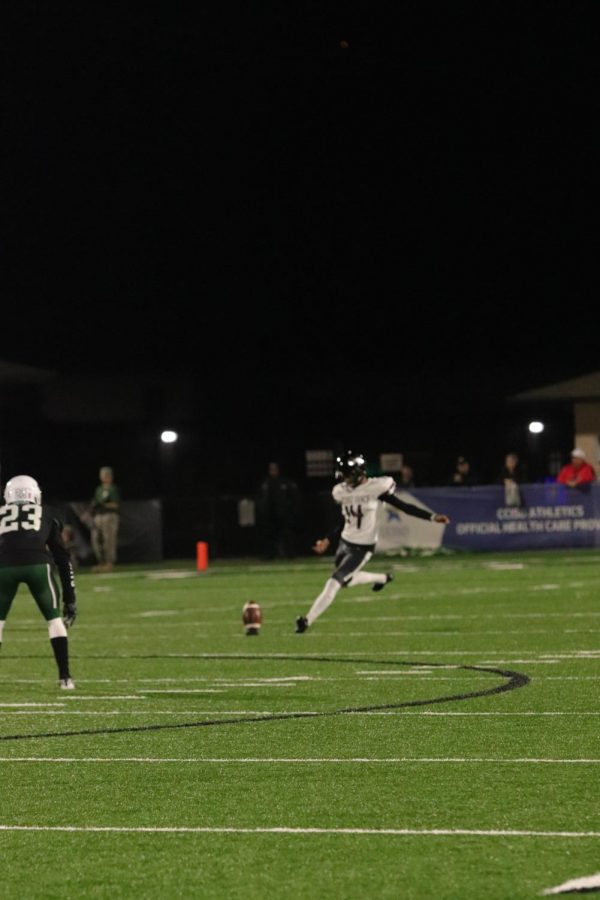 While Clear Falls preparers for kick off in the second half, No. 14, Carlos Villagomez(12), drives the ball down the field.