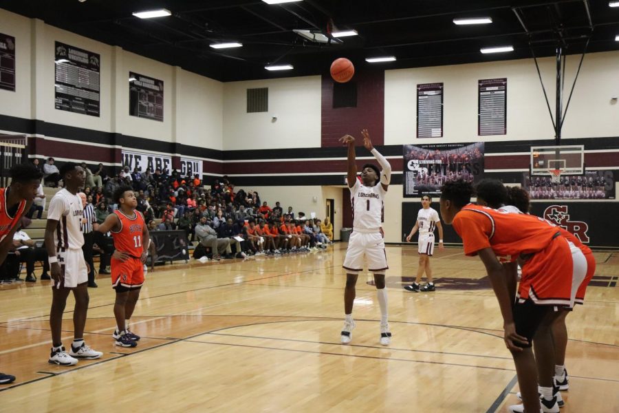 No. 1, Stephen Woods(11), shoots his free throw after 