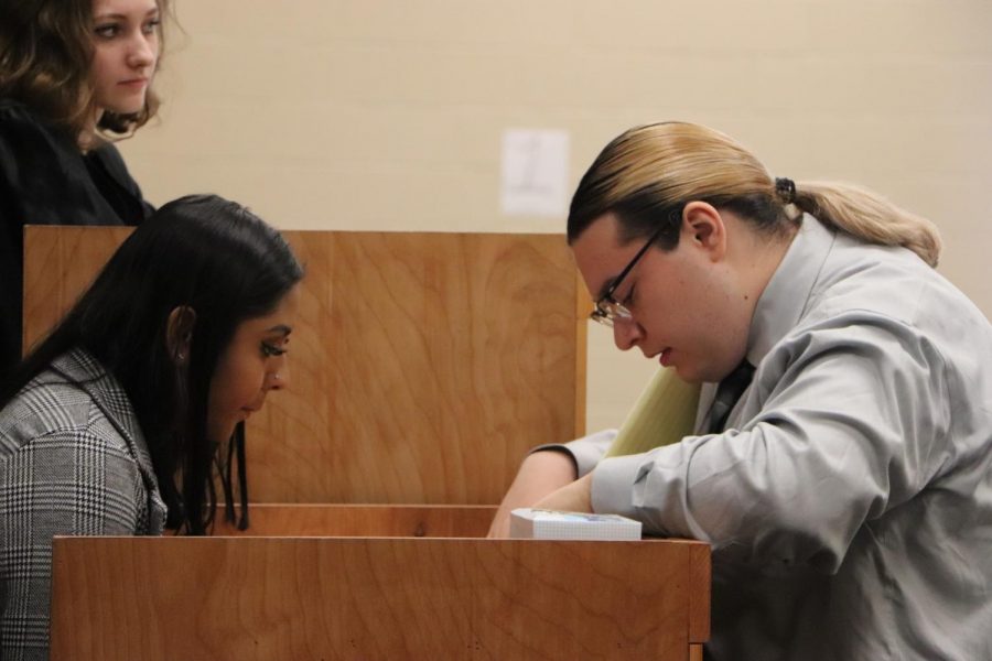 Attorney, Ethan McGinty (11), showing witness Dr.Kim Lenore a mistake in her deposition. 