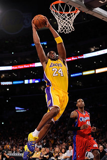 Kobe Bryant dunking the ball aggressively on the Los Angeles Clippers Rasual Butler.  https://www.flickr.com/photos/boixoesnois1987/4067656449 