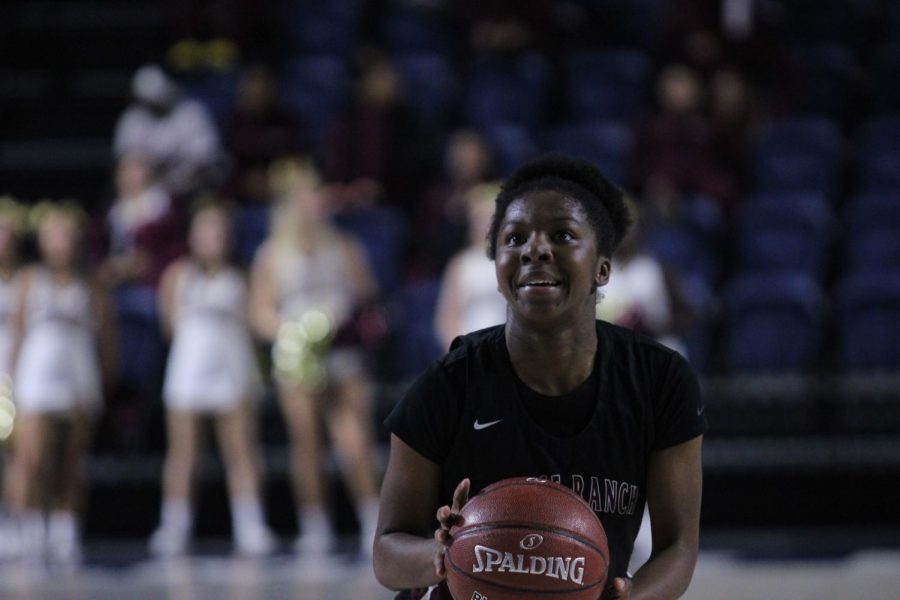Rachel Okoye shoots a free throw to score a point for George Ranch.