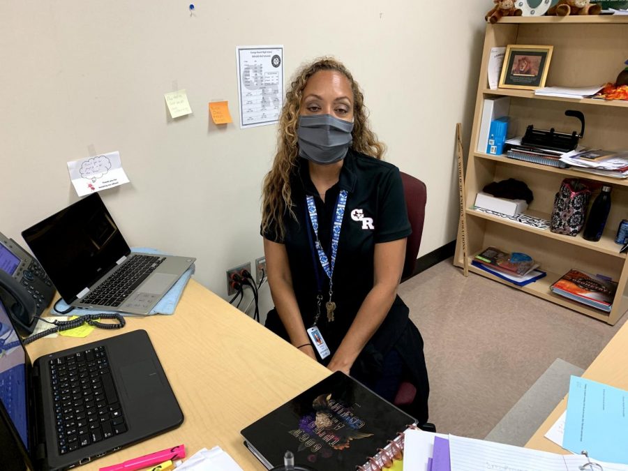 Mrs. Clay quietly sits at her classroom desk. A classroom in which she strives to make a great environment for her students.