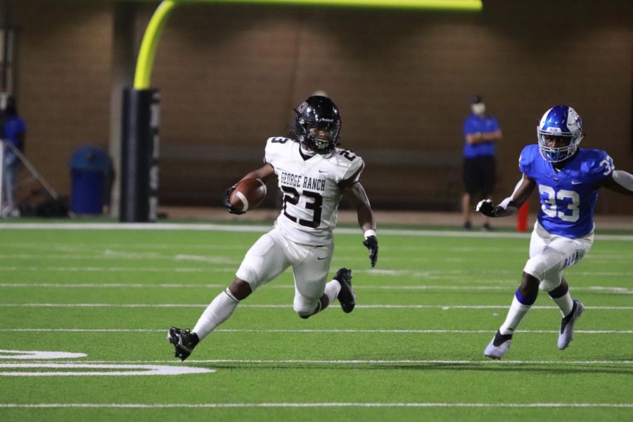 No 23. Davion Jenkins (12) navigating through the Mustangs tough defense.