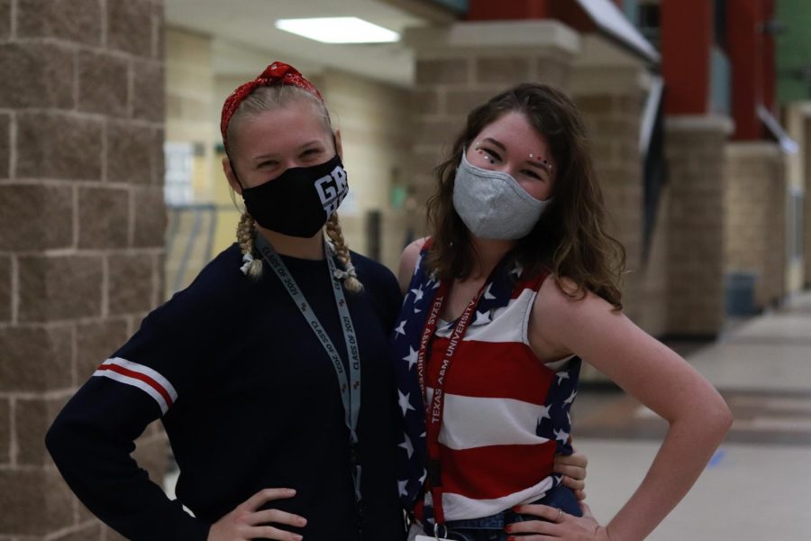 Kyra Apodaca (12) and Rachel Lafferty (12) proudly showing off their school spirit.