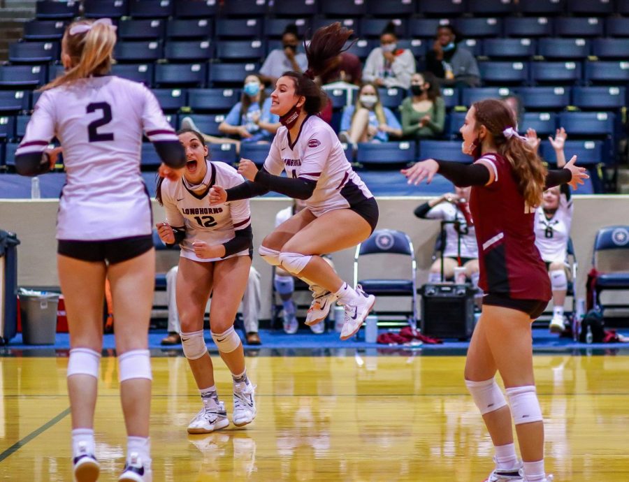 No. 4 Elyssa Giries (12) scores a point for the Longhorns.