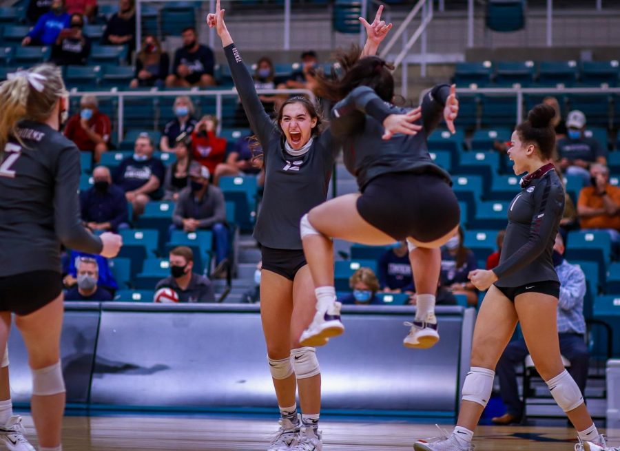 No. 12 Logan Lednicky (11) after scoring another point for the Longhorns during the fifth and final match. 