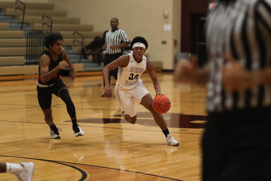 No. 24 Kamren Sheppard (11) was making his way down the court to make a layup thus leaving the score 30-18 in the second quarter. 