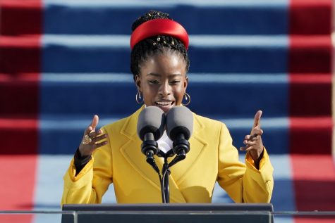 Amanda Gorman reads a poem during the 59th Presidential Inauguration at the US Capitol in Washington DC on January 20, 2021.