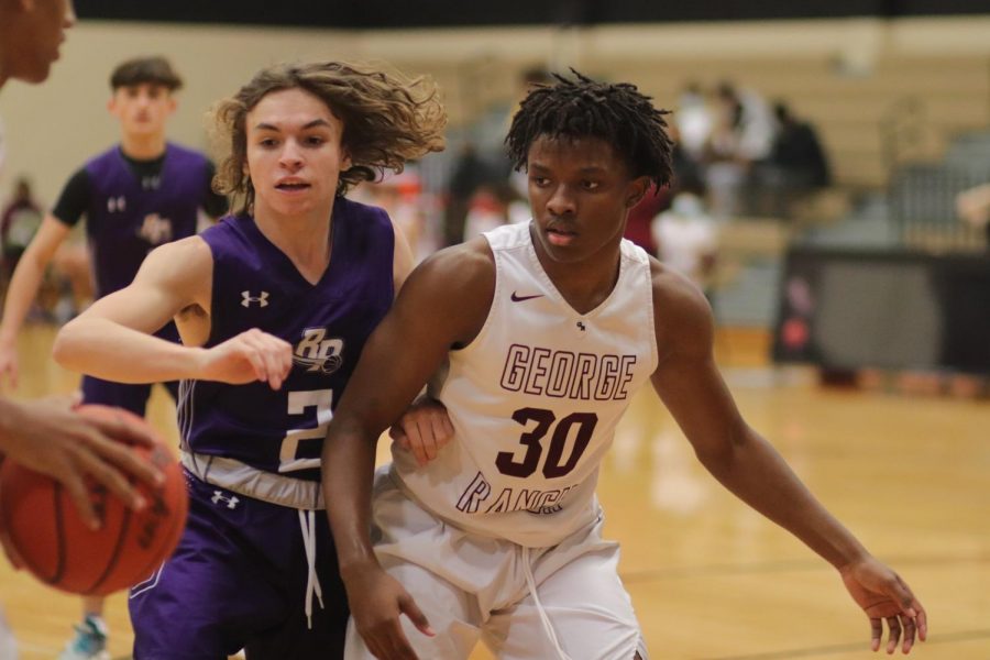 No. 30 Matthew Lambert (11) was in the zone when it came to guarding the Ridge Point player from his teammates. 