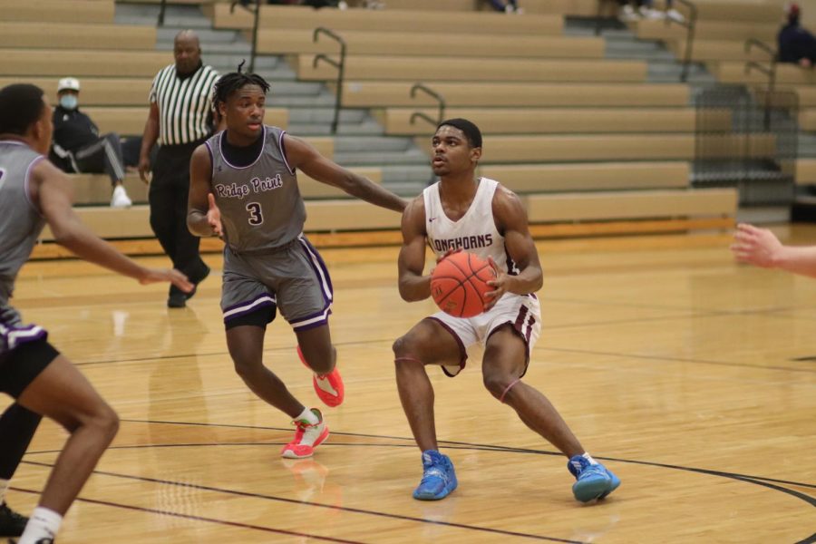 No. 1 Stephen Woods (12) sprang off his feet making the shot thus bringing the score to 12-19.
