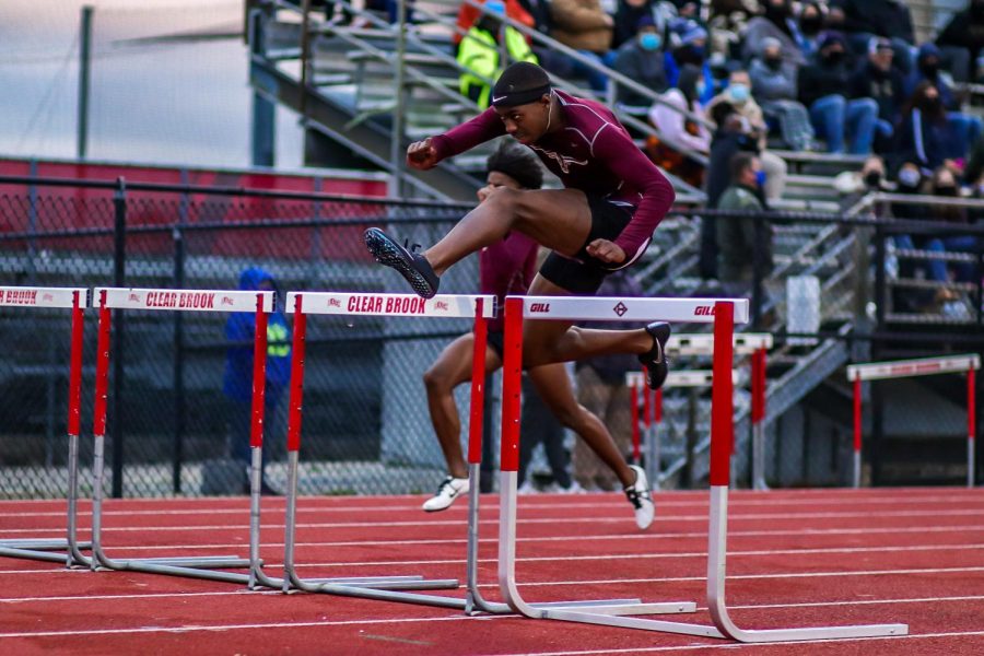 Bryce+McCray+%2812%29+competing+in+the+boys+110m+hurdle+race+alongside+his+teammate+Shane+Gardner+%2811%29.+McCray+finished+first+with+a+time+of+14.60+seconds%2C+and+Gardner+second+with+a+time+of+15.06.