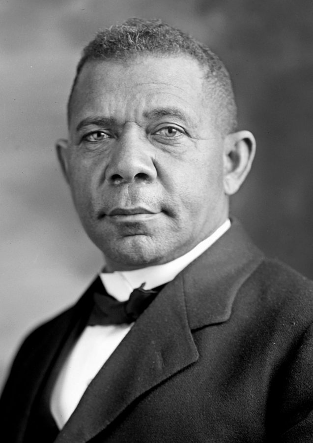 Booker T. Washington posing for a formal picture as he was a well known educator and writer.