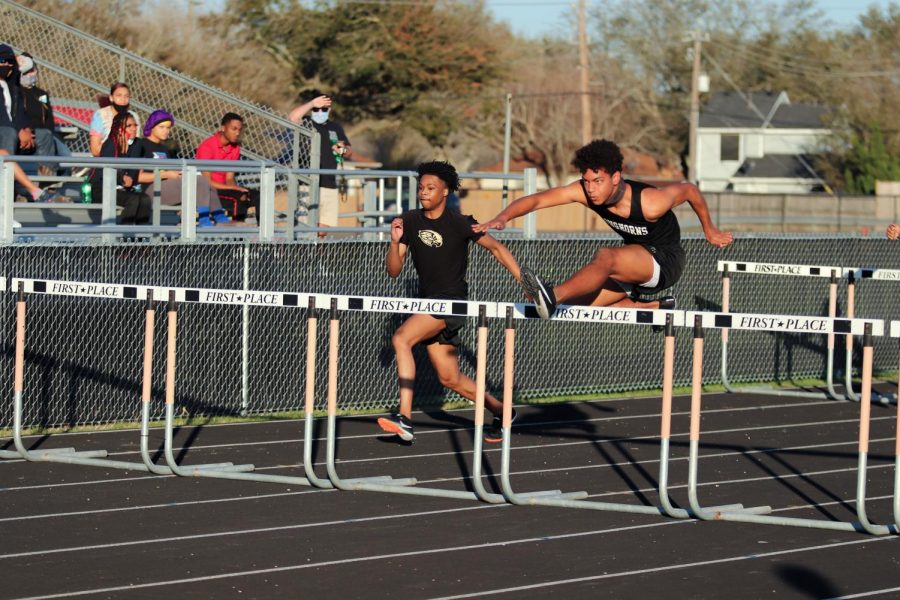 Adrian Falkquay (9) with carefully timing out his step he was able to jump over the hurdles without touching them.