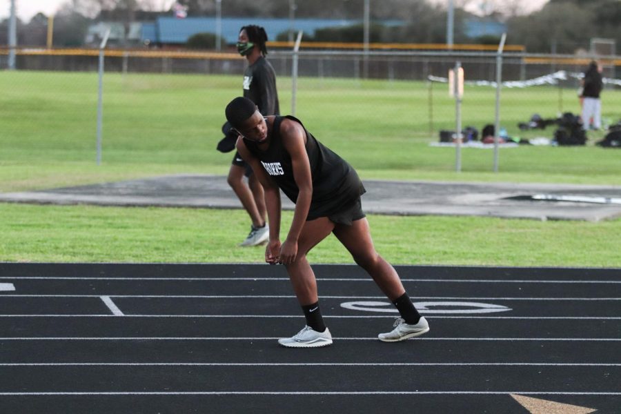 Sheldon Goodman (9) was in the first hand off for the 4x200m. He was waiting for his teammate to get closer to start running.  