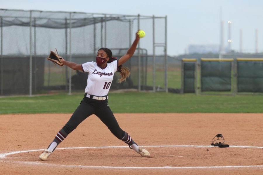 No. 10 Zaria Turner throwing a fast pitch over to the Elkins batter.