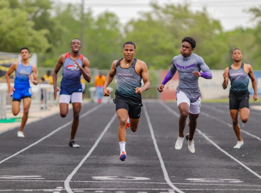 Grant+Celestine+%2812%29+won+the+district+title+in+the+boys+400-meter+dash+with+a+new+personal+record+time+of+49.89.