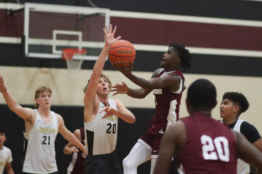 No. 1 Evan Howard (11) going for a lay-up.