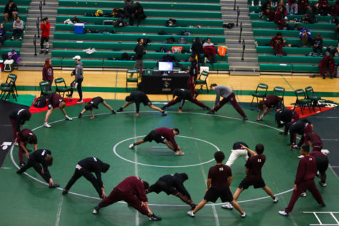 Warm up. The George Ranch Varsity and JV warm up and prepare for the up coming tournament.