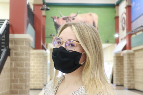 Amid the new surge of positive chases, many students and faculty have opted to continue wearing face coverings to school.