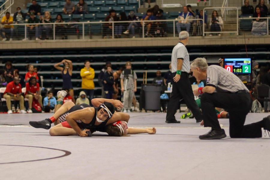 Pain! Samad Al-Khatib (12) bending the leg of his opponent back and getting a Turk.