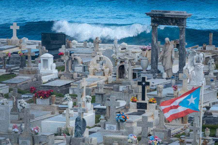 Santa María Magdalena de Pazzis Cemetery rests alongside Castillo San Felipe del Morro, overlooking the ocean.