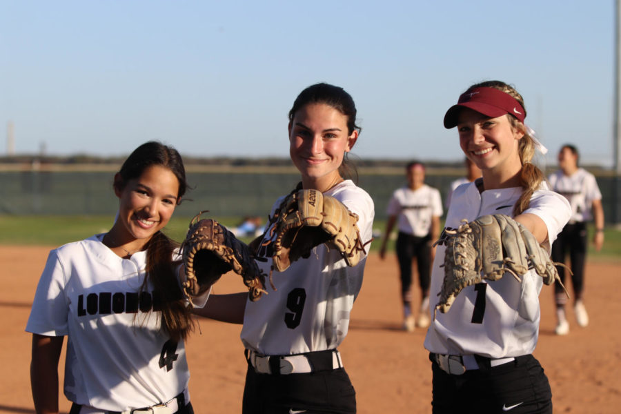 No. 4 Evelyn Flores (12), No. 9 Camryn Couvillion (12), and No.1 Kate Dolan (11) taking a moment to get a picture together before their game!