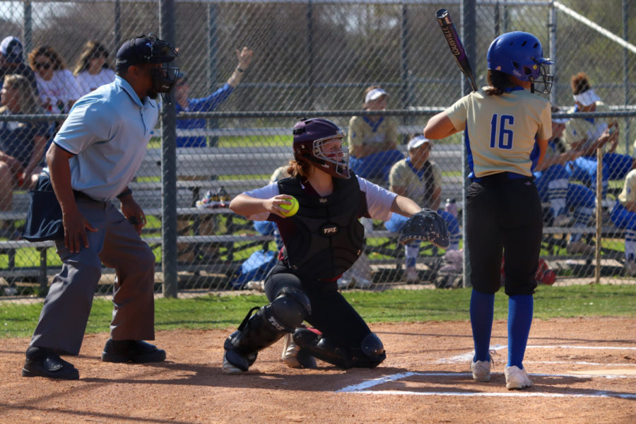 No. 17 Carlee Long (10) throwing the ball back to the pitcher.