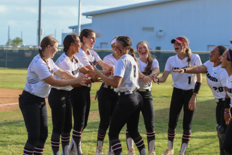 No. 8 Kennedy Marlow (12) getting hyped up by her team mates