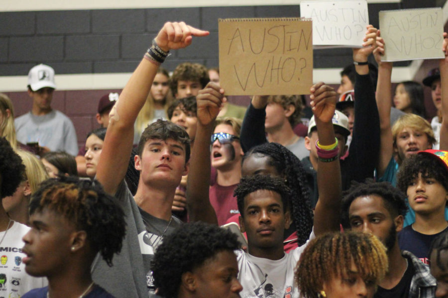 Gregor Jones (12) and Russel Franklin (12) show their support for the lady longhorns. 