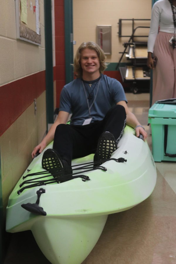 Woods Kuhel (11) with his Kayak. 